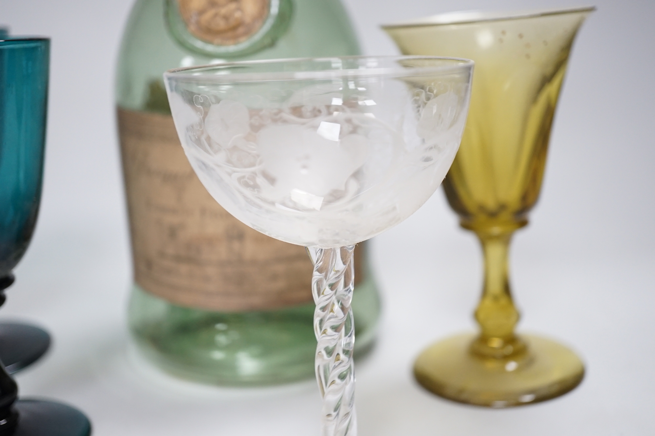 A group of green Georgian and later glass, together with a Napoleon brandy bottle